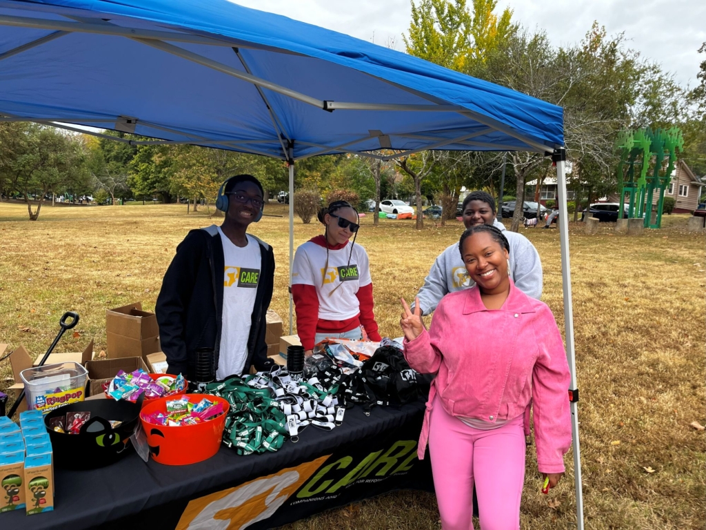 volunteers giving away leashes